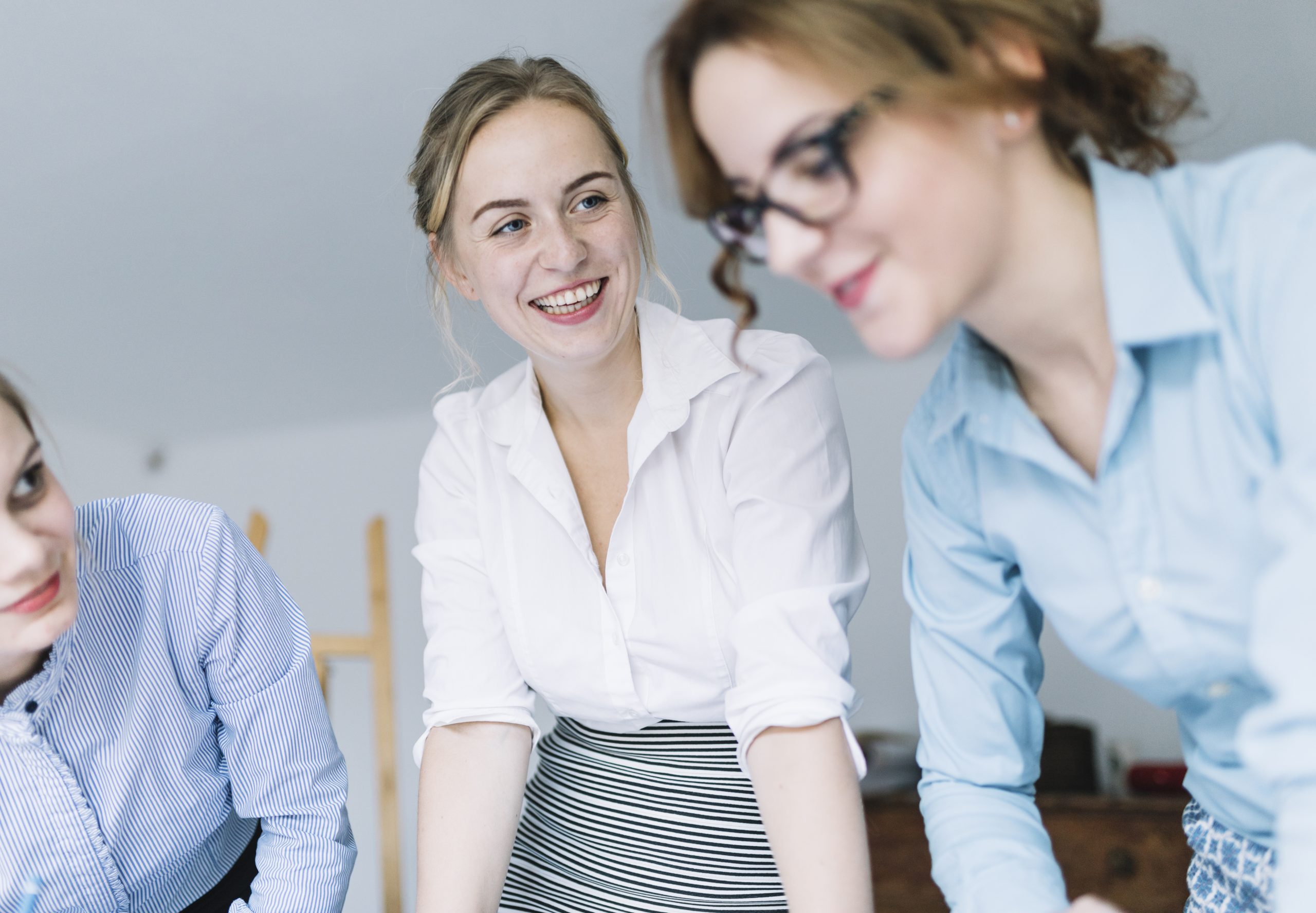Office workers collaborating